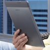 Amazon_Kindle_DX_Ereader_Elegant_Paper_Ink_Color_Cute_Man_Model_Hand_Full_Body_Dandygadget_Portable_Media