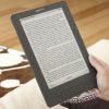 Amazon_Kindle_DX_Ereader_Elegant_Paper_Ink_Color_Cute_Teen_Model_Hand_Full_Body_Dandygadget_Portable_Media