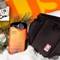 Partnering with Burton Snowboard, KODAK proudly is going to showcase its PLAYSPORT video camera (Zx3) in Burton edition at CES 2011 which is dressed with Burton style:an orange pixilated design...