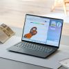 ASUS Googlebook 14 laptop open with its 3K OLED display visible